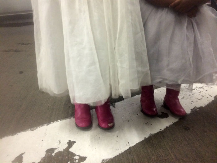 Cowgirl boots on girls at church in Texas